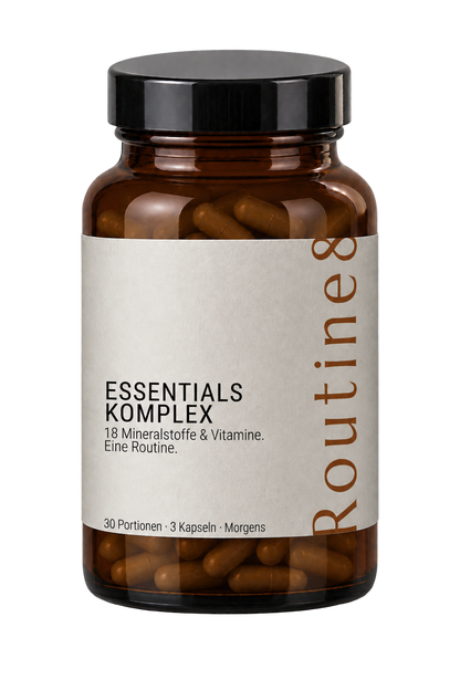 ROUTINE8 Essentials Komplex Multivitamin-Nahrungsergänzungsmittel im Braunglas mit hellen Kapseln.